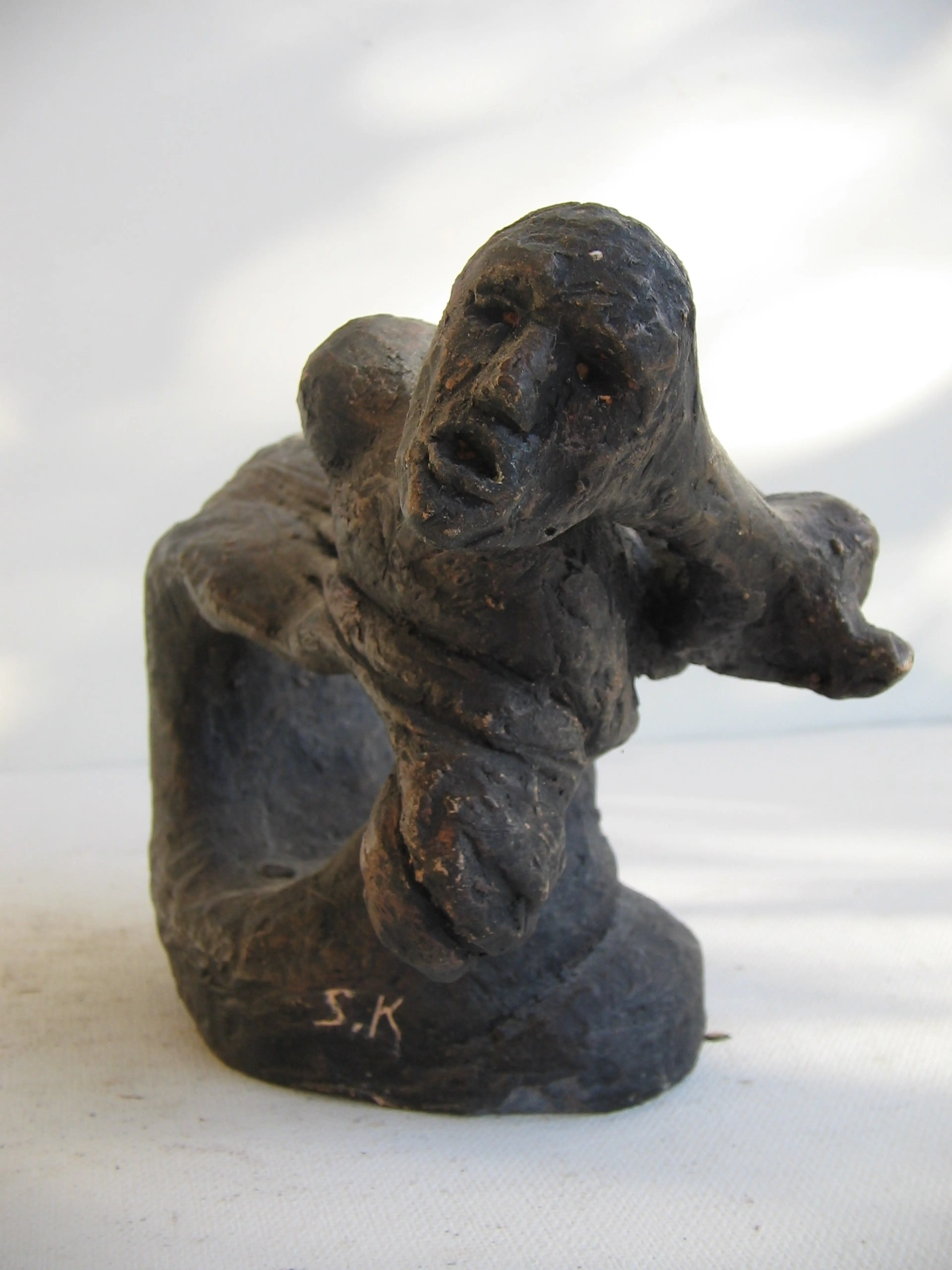 "Unbearable humiliation", patinated terracotta