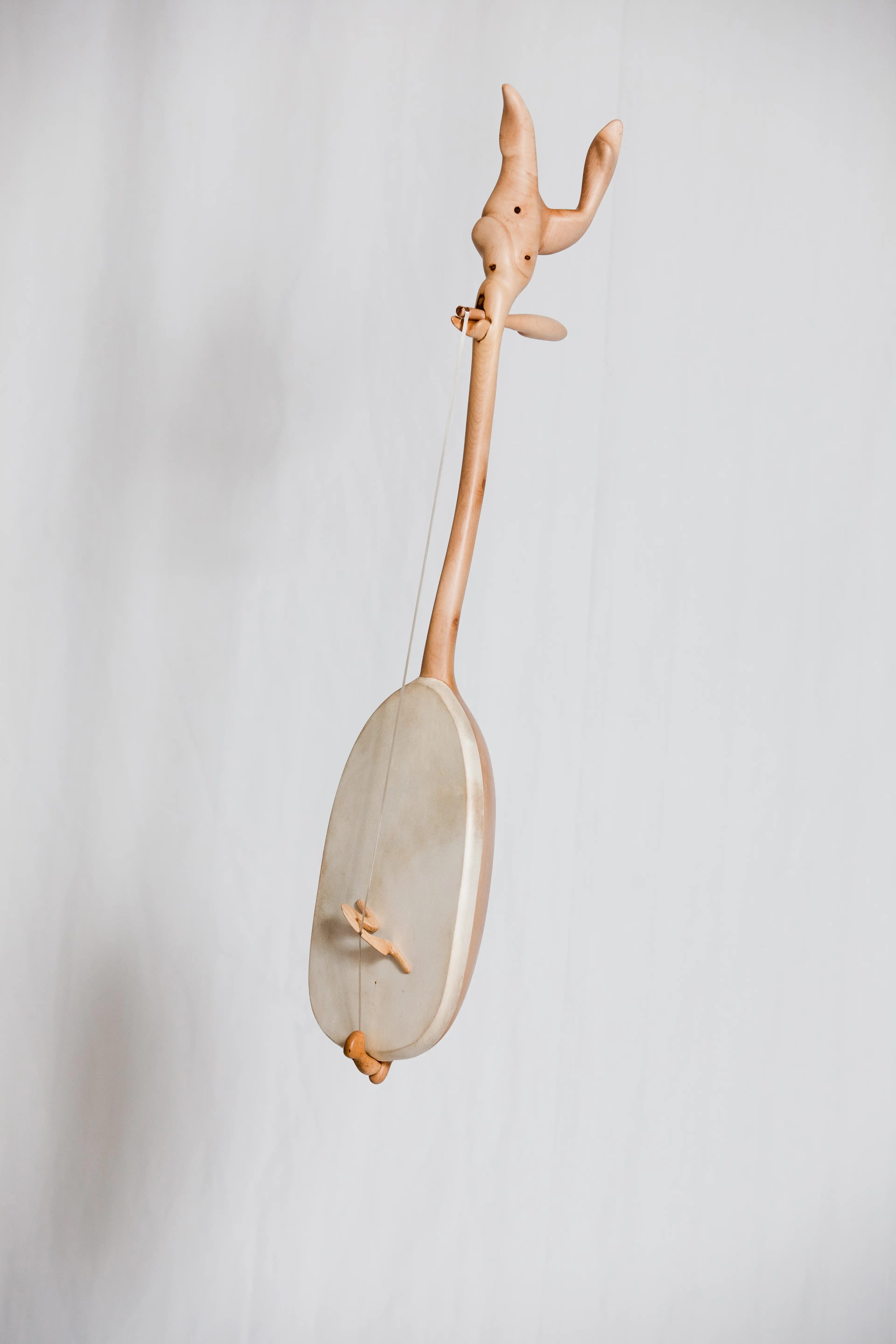 "Musical instrument III", wood (maple), goatskin and horsehair