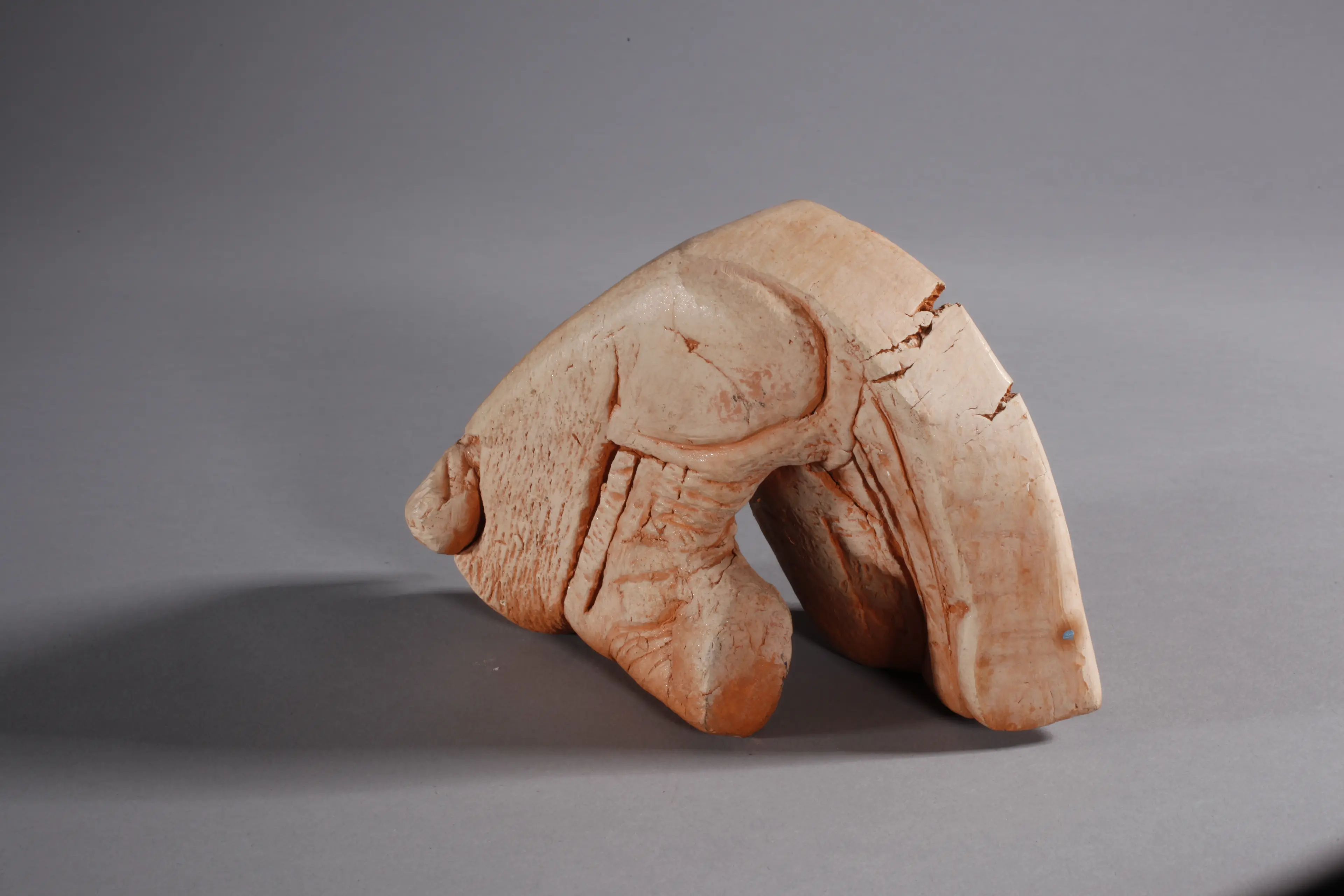 "Irreparable crack down", patinated terracotta